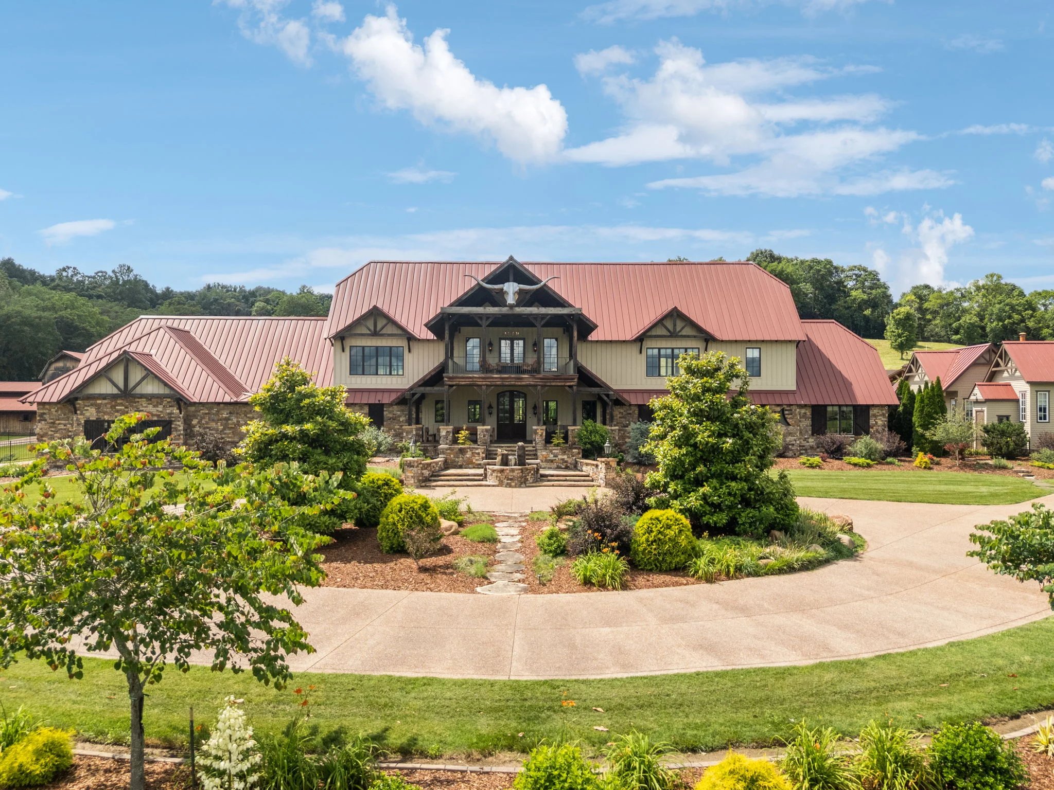 Front elevation and grounds of a lodge estate